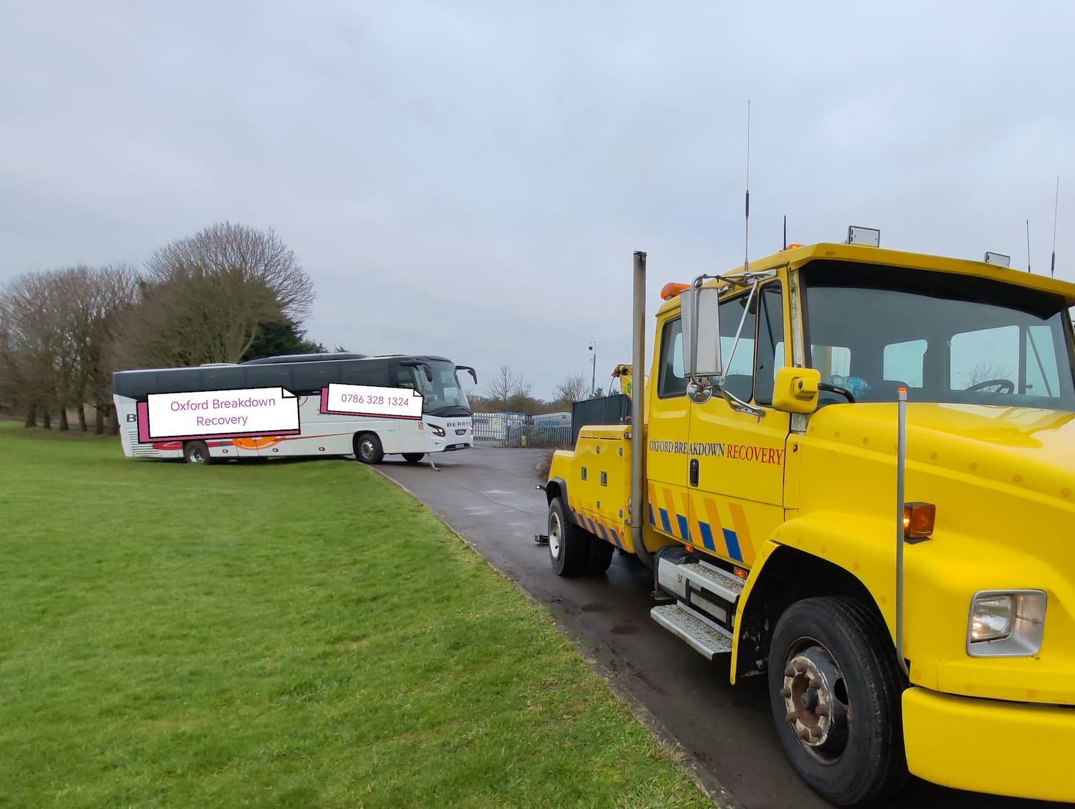 Coach recovered from wet grass at Oxford sportsfield